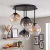 Cluster ceiling light Koyoto, ribbed smoke and amber glass shades over a dining table