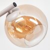 Modern globe wall light Koyoto with three amber glass shades on a sand-coloured metal bar