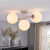 Modern Globe ceiling light Gastor with three white glass shades in cluster