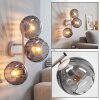 Modern Globe Wall Light Koyoto with a vertical cluster of three smoke glass shades