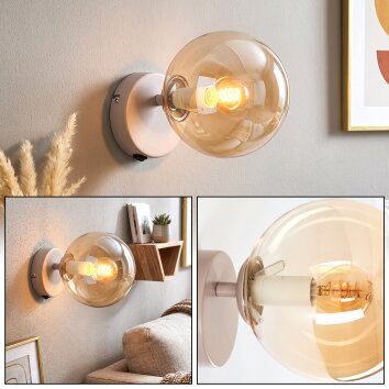 Modern Globe wall light Gastor with round amber glass shade and on/off switch