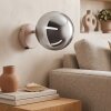 Modern Globe wall light Gastor with a smoke-coloured glass shade and sand-coloured mount