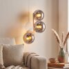 Modern Globe wall light Gastor with three round smoke glass shades in a vertical row