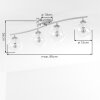 Modern globe ceiling light Gastor with four curved-bar glass shades in smoke and clear