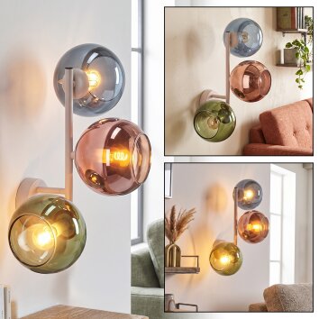 Retro Globe Wall Light Koyoto with three coppery, blue and green glass shades for the couch