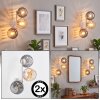Globe wall light Koyoto set of 2 with smoke-coloured and amber shades beside a mirror