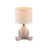 Leuchten Direkt beige table lamp TED, 3000 Kelvin warm white, seated-figure base